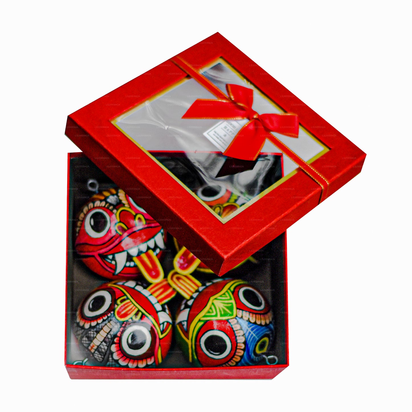 Traditionele Raksha-maskers uit Sri Lanka (Mayura, Maru, Agni, Naga) beschilderd op kokosnootschalen (verpakking van 4 stuks)